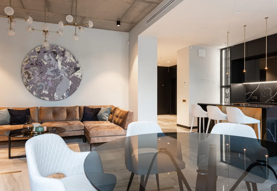 3D living-dining render with circular artwork