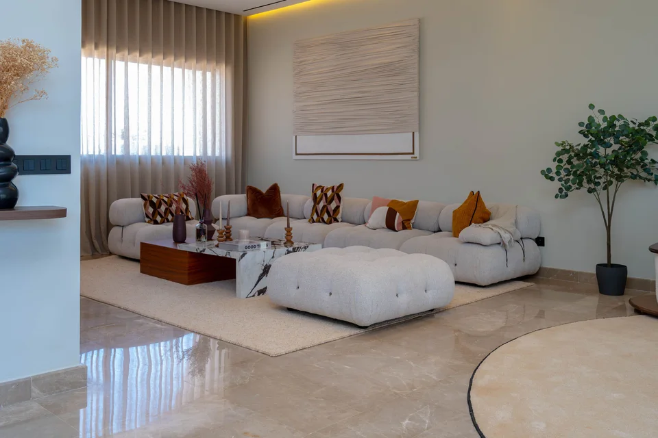 3D visualization of a minimalist living room with bouclé sofa